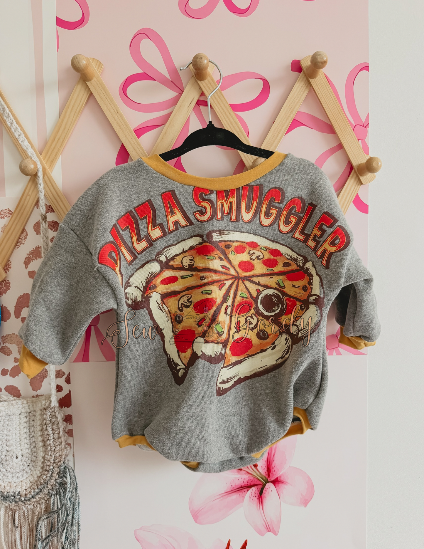 12/18 Smuggler Sweater Romper