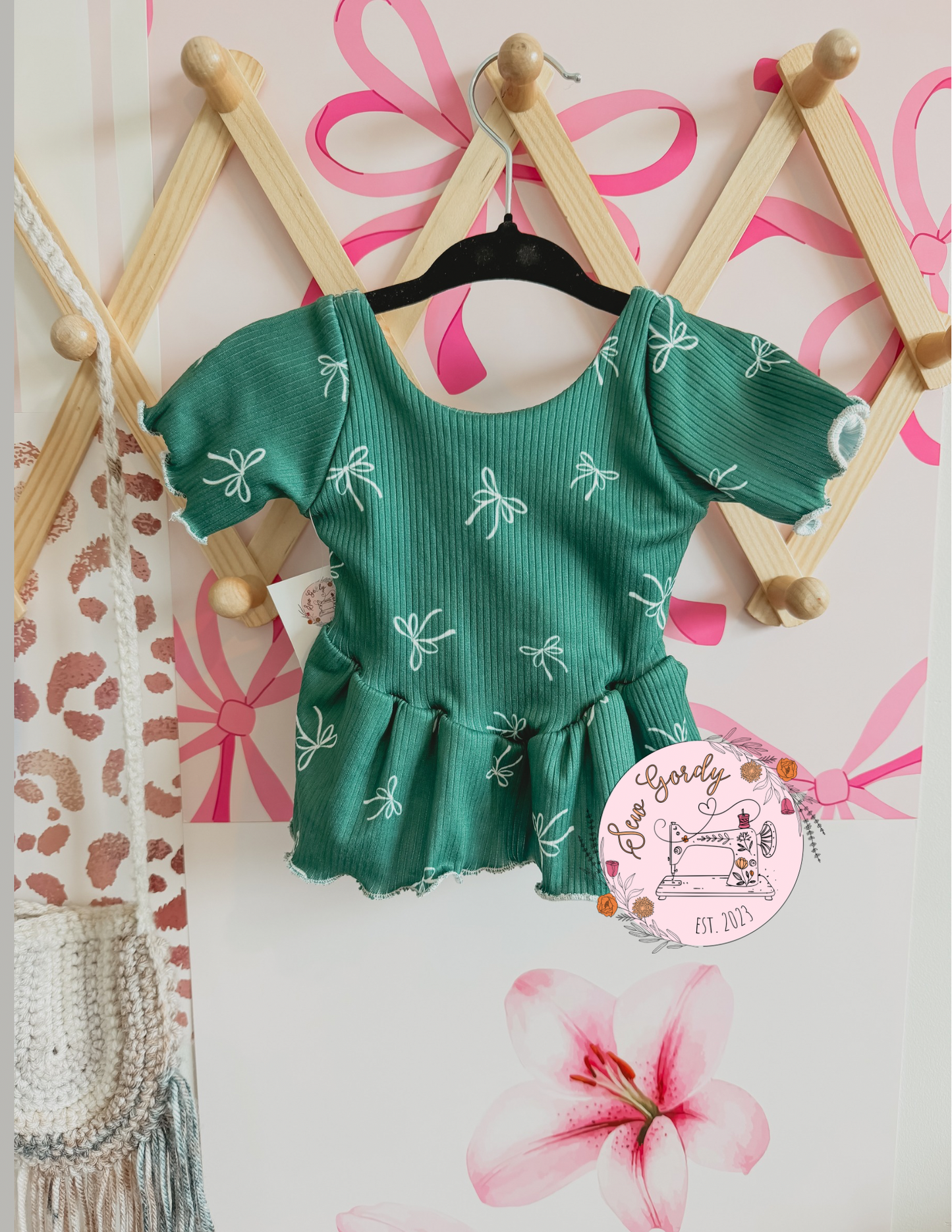 9/12 Bow Peplum
